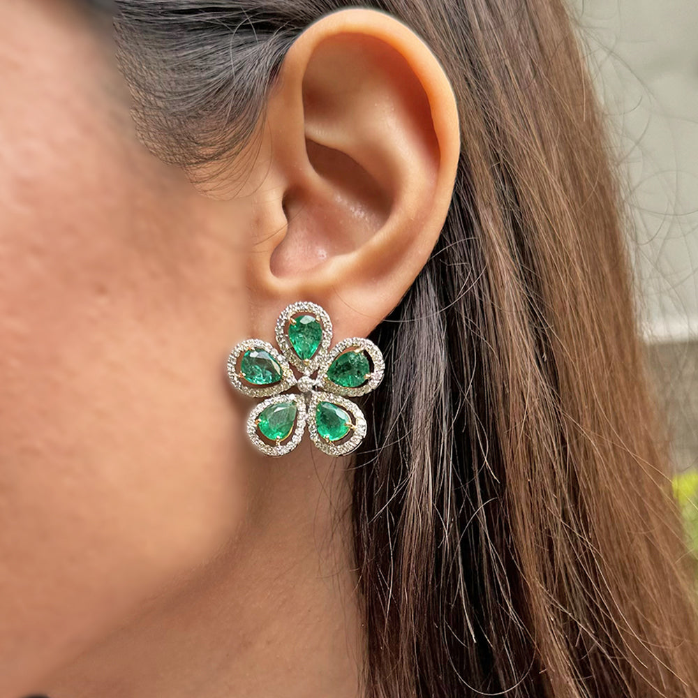 Pear-shaped Emerald and Diamond Floral Earrings.