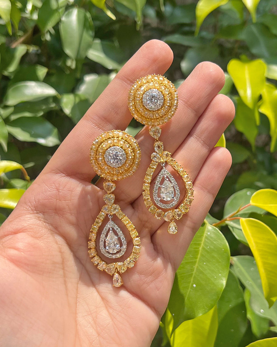 Solitaire Earrings with yellow diamonds in 18KT Gold